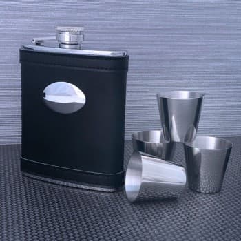 Black leather flask with cups